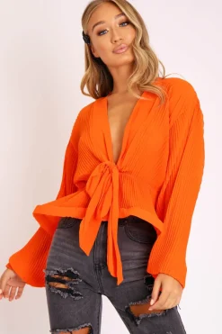 Rebellious Fashion Orange Extreme Plunge Structured Peplum Pleated Top - Ivy