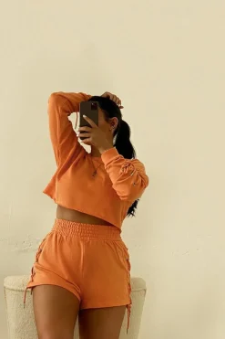 Rebellious Fashion Orange Eyelet Lace Up Shorts - Philippa