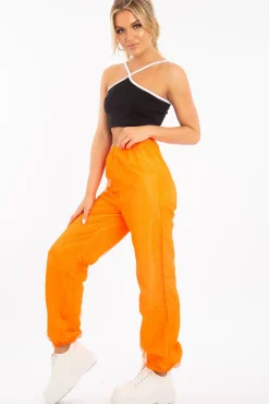 Rebellious Fashion Orange Fishnet Cuffed Joggers - Ryia