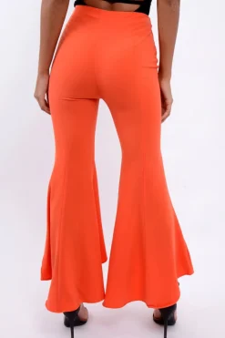 Rebellious Fashion Orange Flare Dip Hem Trousers - Fraya