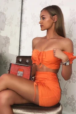 Rebellious Fashion Orange Ruched Bow Tie Crop Top Skirt Co-ord - Chasity
