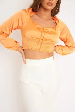 Rebellious Fashion Orange Shirred Long Sleeve Strap Back Detail Crop Top -Traniyah