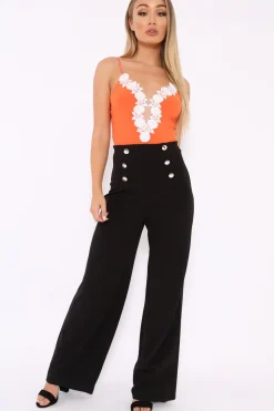 Rebellious Fashion Orange Slinky Bodysuit with Floral Embroidery - Adila