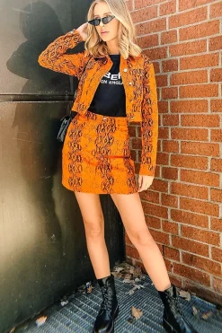Rebellious Fashion Orange Snake Print Trucker Jacket Mini Skirt Co-Ord - Kiera
