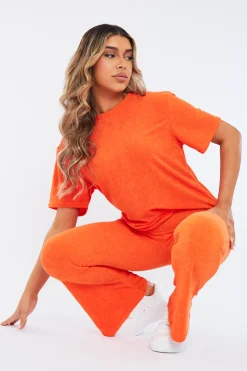 Rebellious Fashion Orange Towelling T- Shirt & Flare Trouser Set - Tania