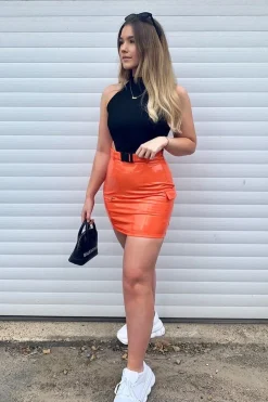 Rebellious Fashion Orange Vinyl Zip Detail Utility Buckle Skirt - Davina