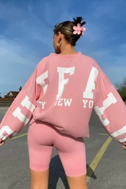 Rebellious Fashion Pink Buffalo New York Slogan Sweater Dress - Nazaria