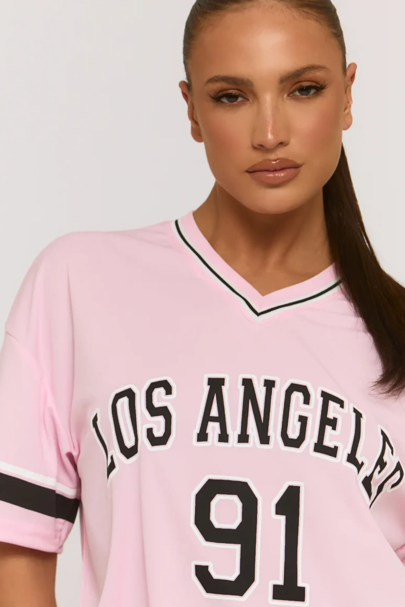 Rebellious Fashion Pink Oversized Varsity Football T-shirt - Austin