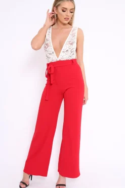 Rebellious Fashion Red Plunge Front Lace Jumpsuit - Felice