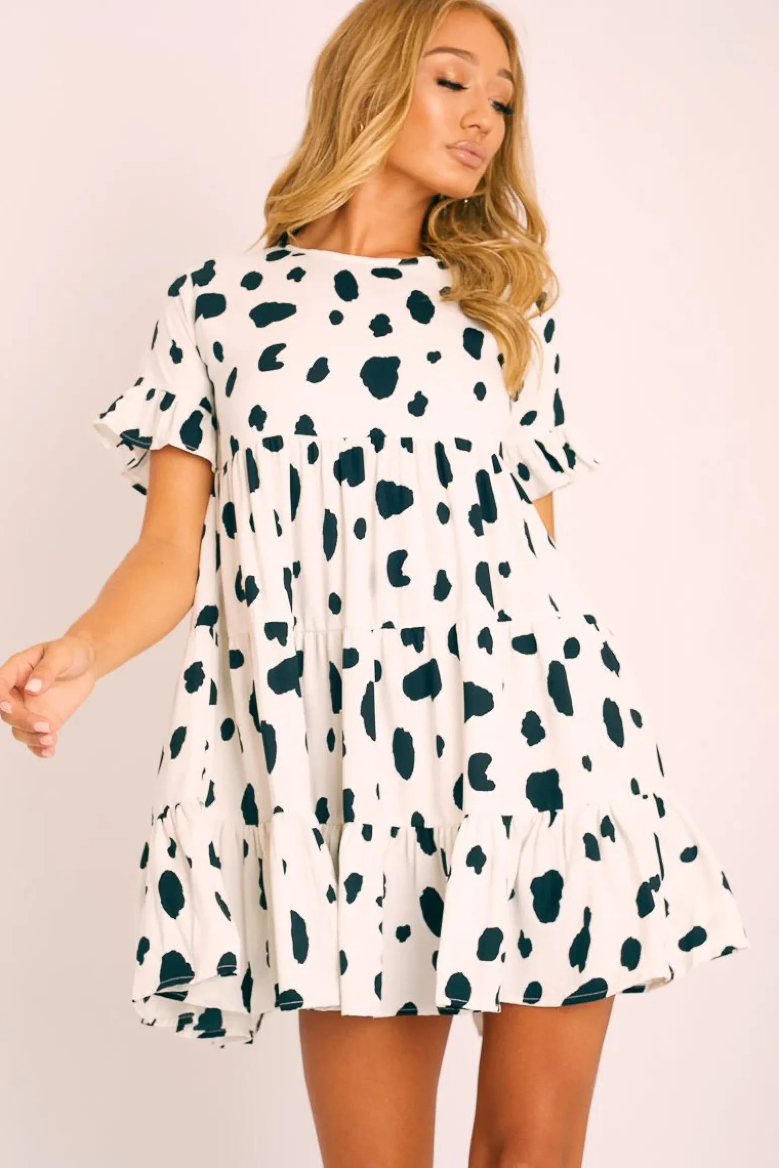 Rebellious Fashion White Black Cow Print Tiered Smock Dress - Makensi