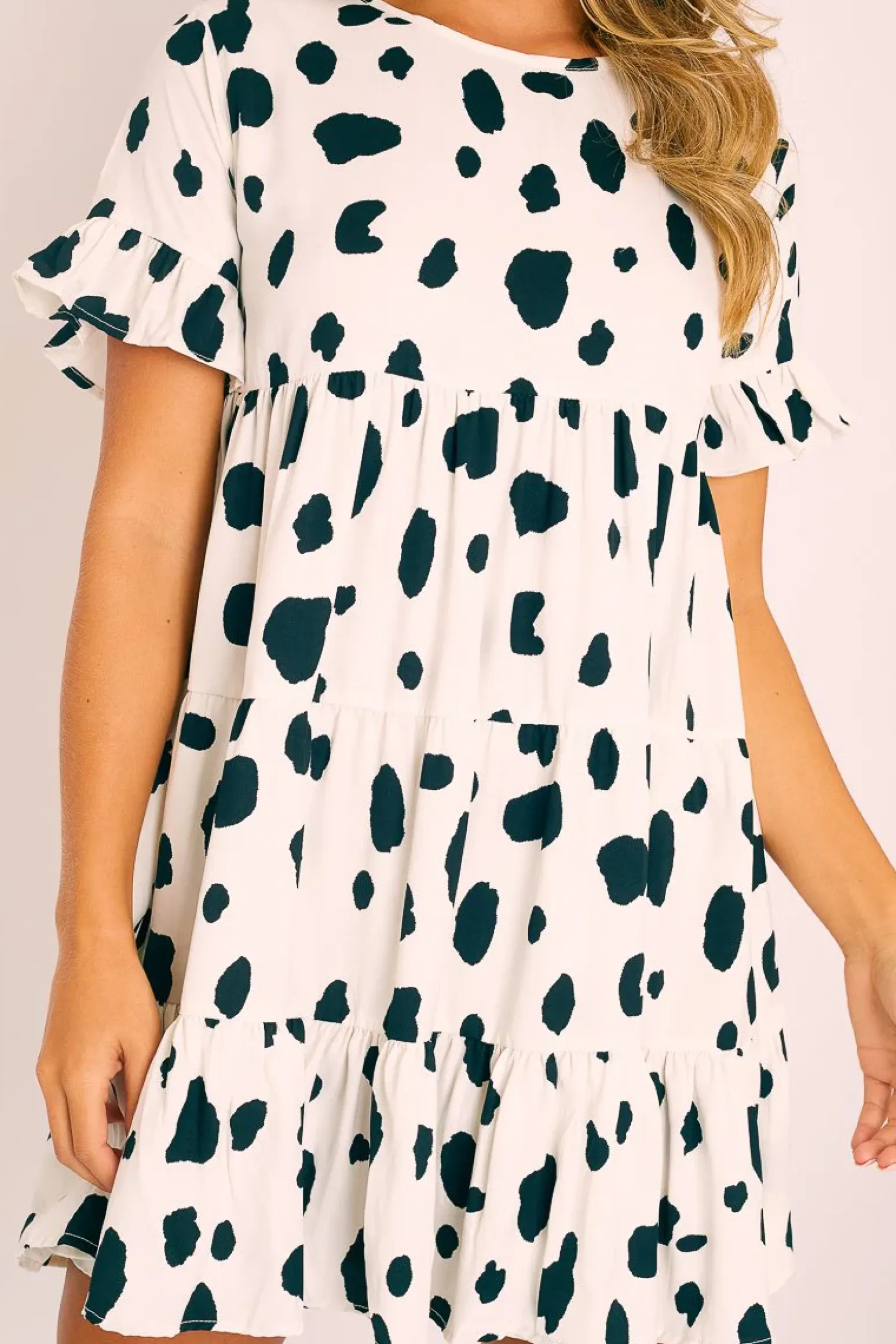 Rebellious Fashion White Black Cow Print Tiered Smock Dress - Makensi