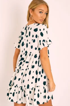 Rebellious Fashion White Black Cow Print Tiered Smock Dress - Makensi