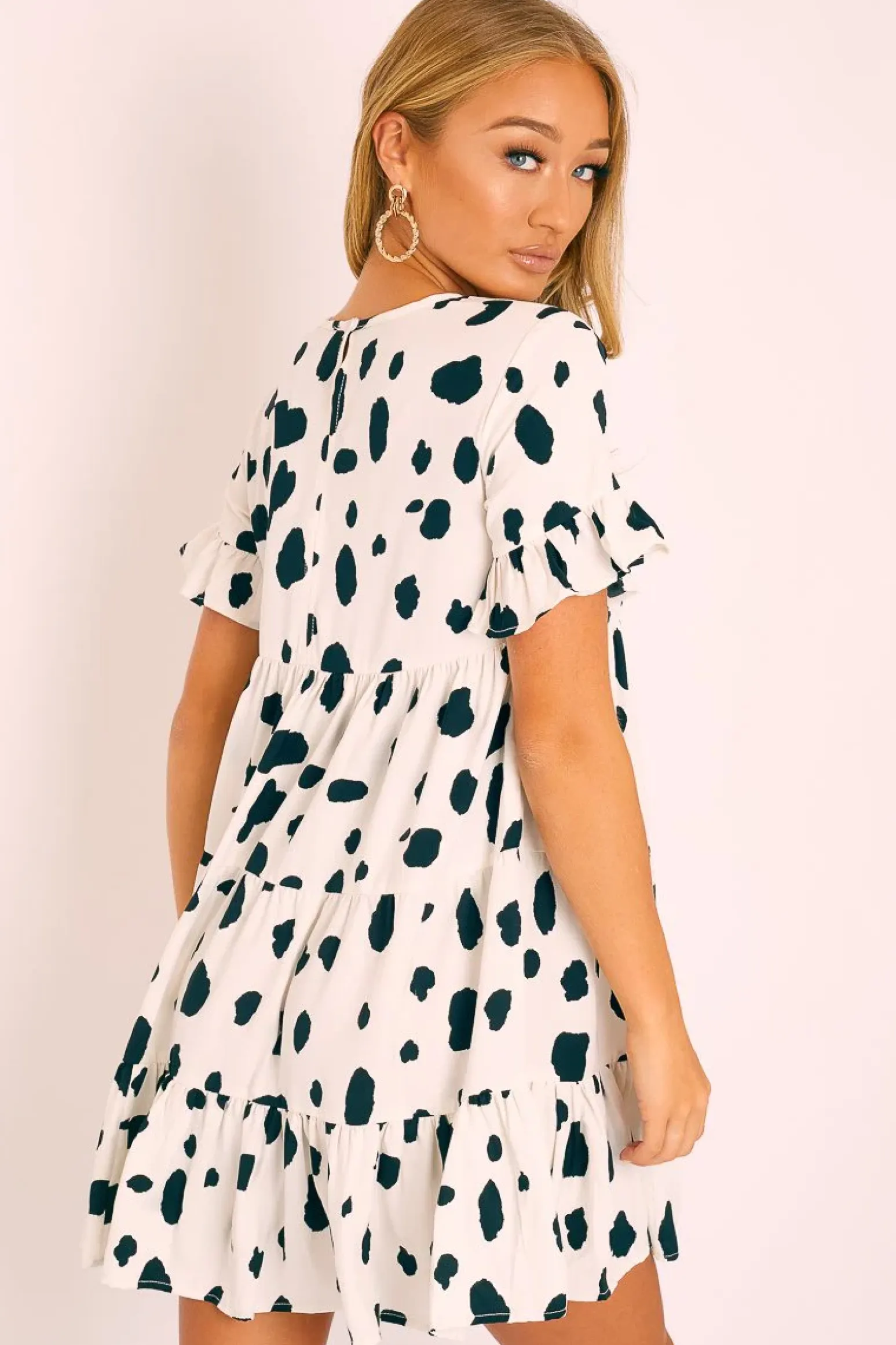 Rebellious Fashion White Black Cow Print Tiered Smock Dress - Makensi