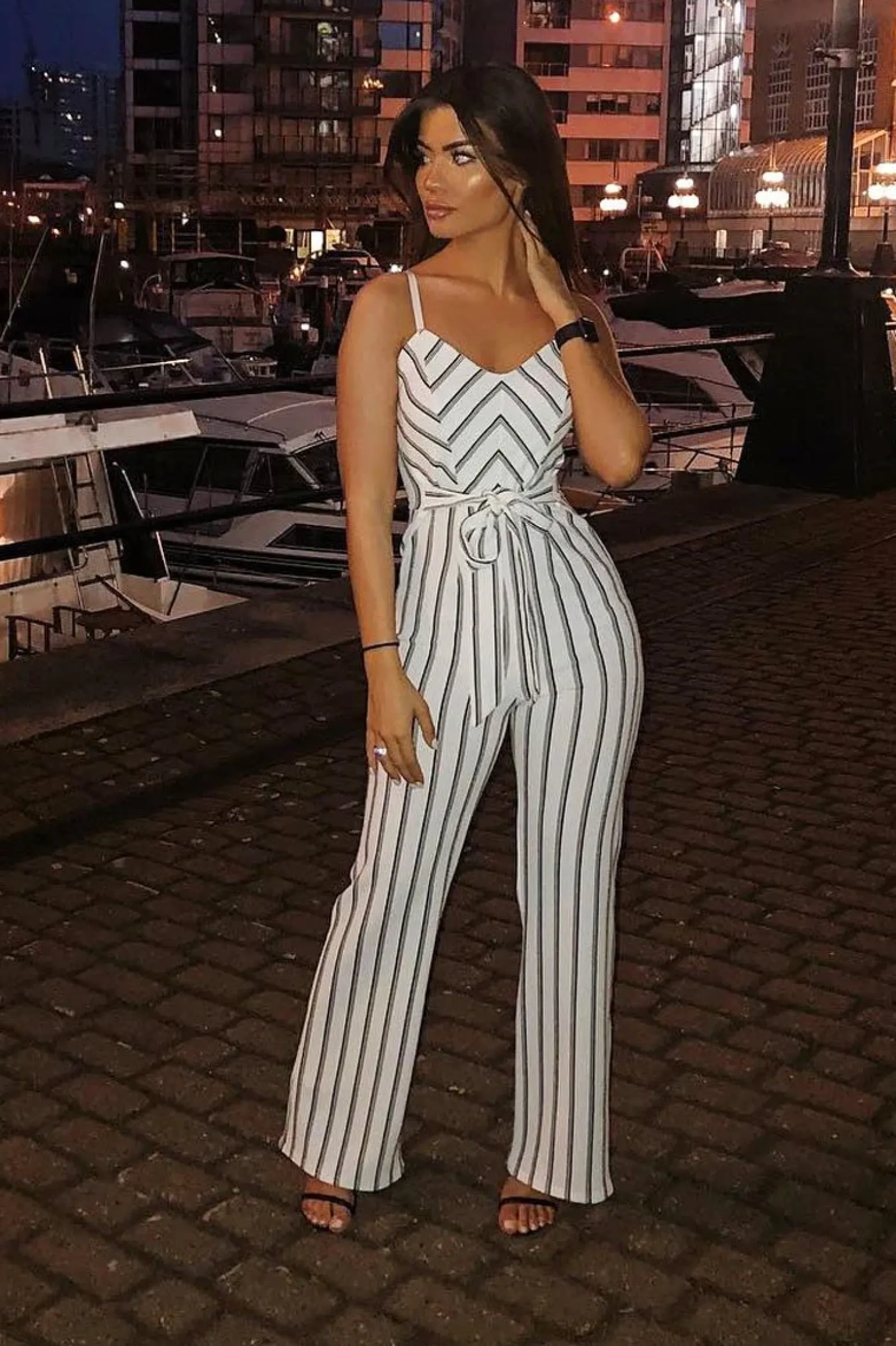 Rebellious Fashion White and Black Stripe Plunge Tie Waist Jumpsuit - Tashi