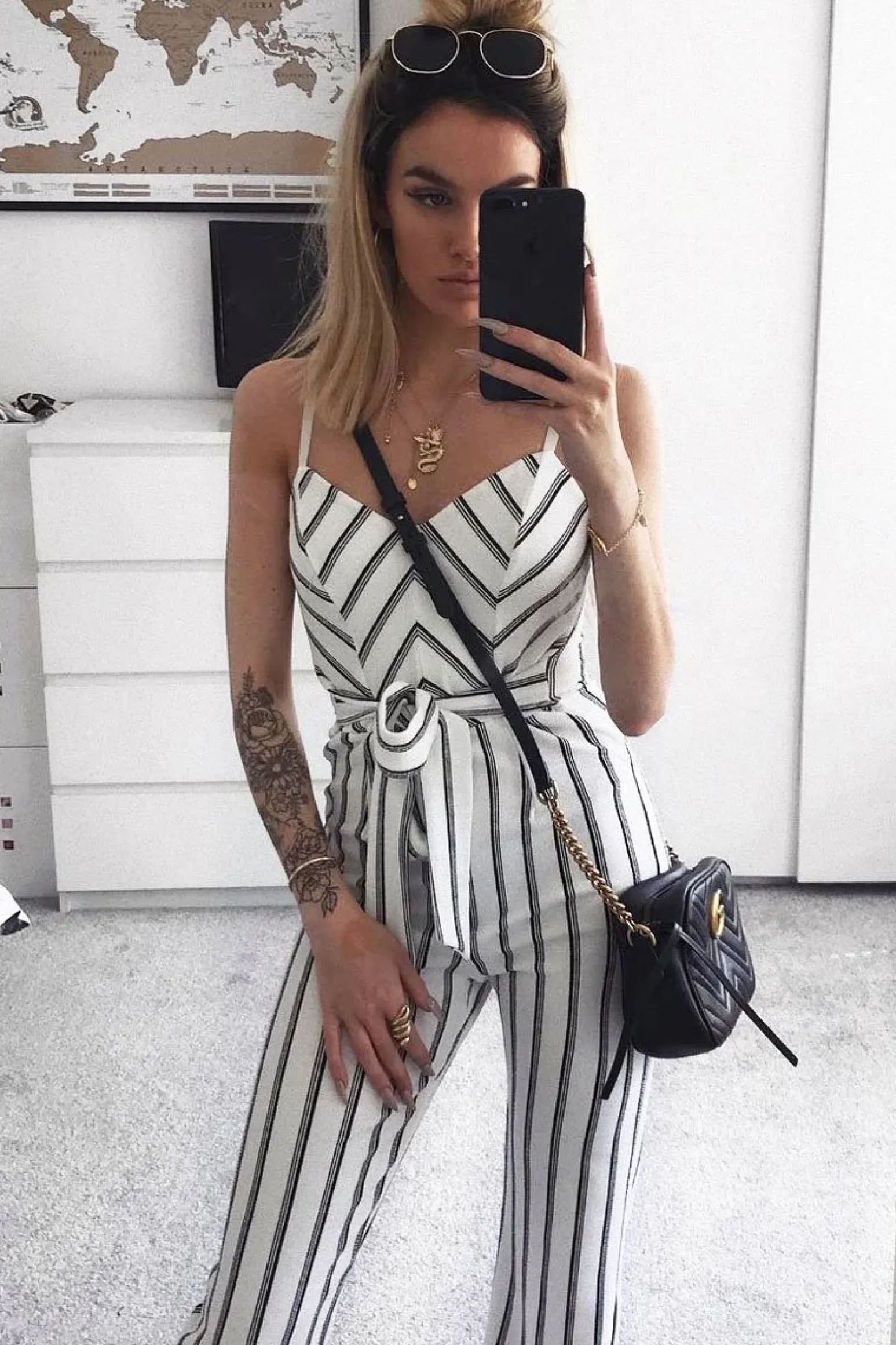 Rebellious Fashion White and Black Stripe Plunge Tie Waist Jumpsuit - Tashi