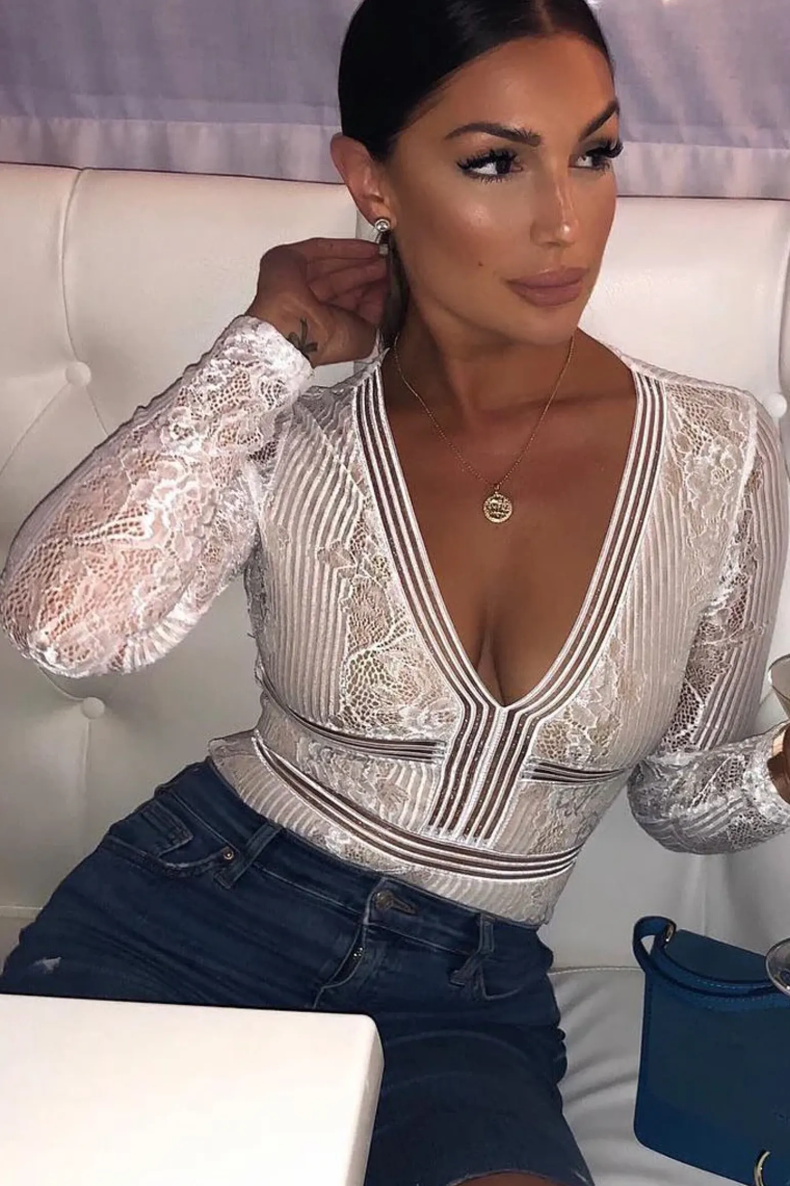 Rebellious Fashion White and Nude Lace Long Sleeve Open Back Bodysuit - Ellice