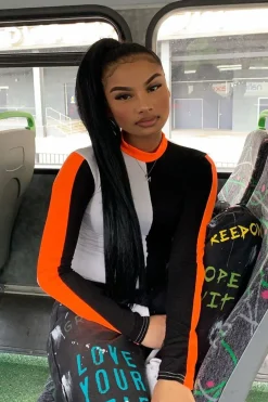Rebellious Fashion White Black and Neon Orange Contrast Long Sleeved Bodysuit - Lareen