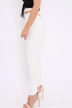 Rebellious Fashion White Cut Out Back Thong Trousers - Aanya
