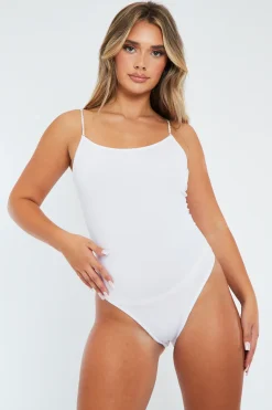 Rebellious Fashion White Embellished Straps Bodysuit - Oshah