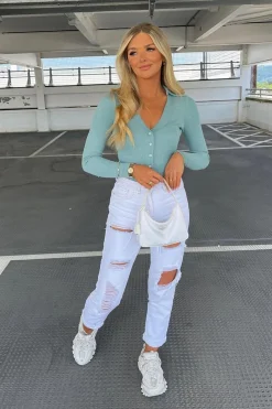 Rebellious Fashion White Extremely Ripped Denim Mom Jeans - Ellynor