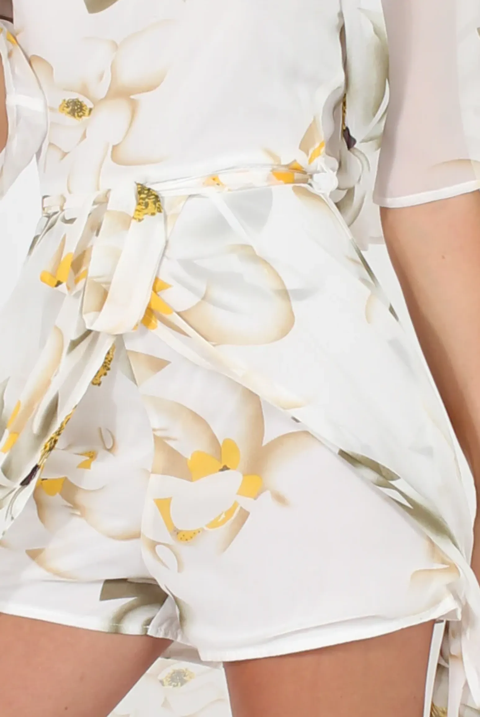 Rebellious Fashion White Floral Dip Hem Playsuit - Caprice