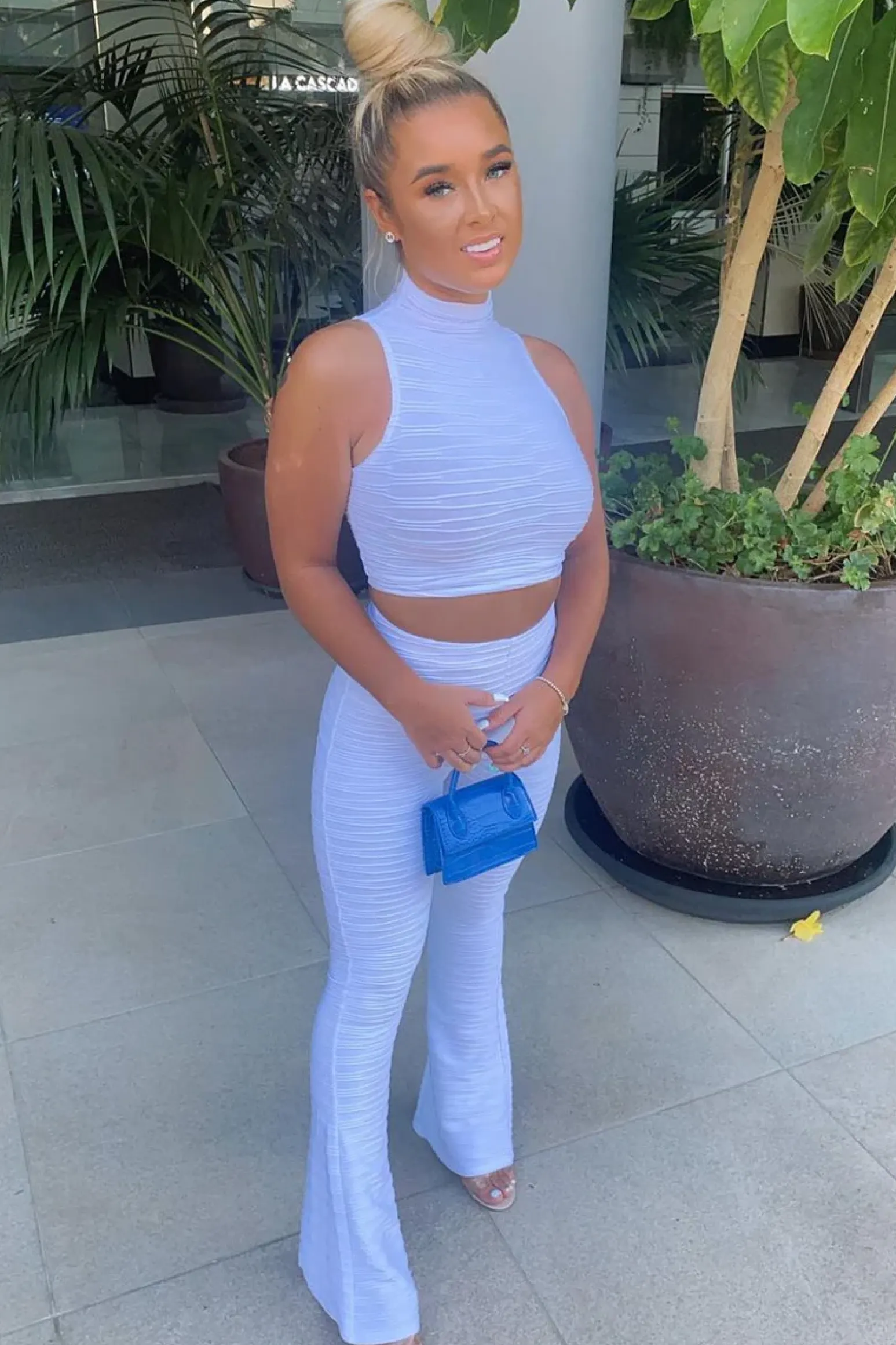Rebellious Fashion White High Neck Crop Top & Flare Pants Set - Dailyn