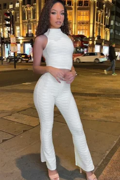 Rebellious Fashion White High Neck Crop Top & Flare Pants Set - Dailyn