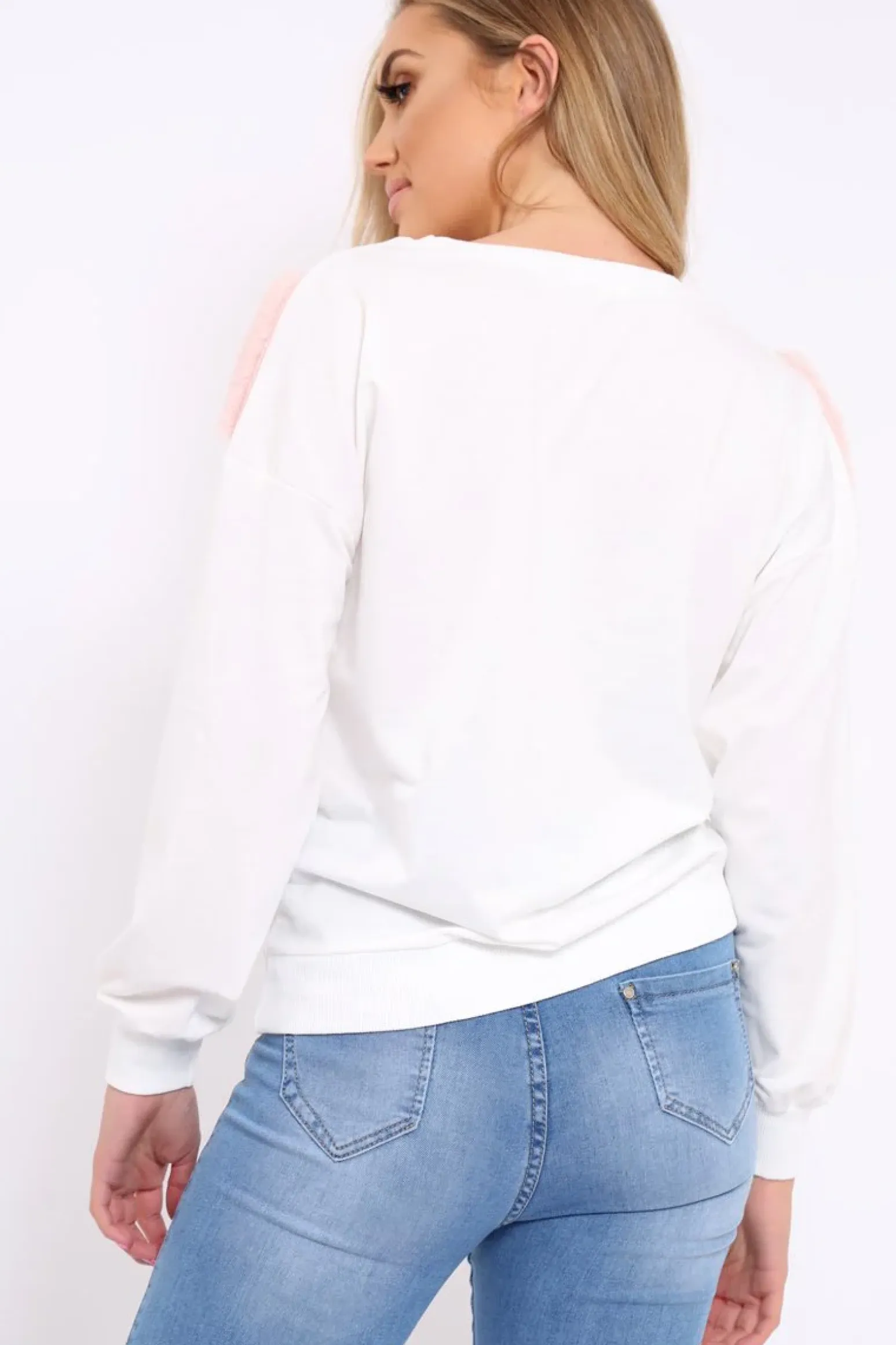 Rebellious Fashion White Jumper with Fur and Pearl Front - Annita
