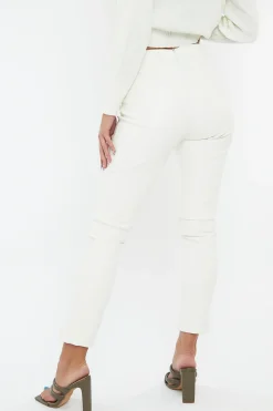 Rebellious Fashion White PU Leather Front Slit Trousers - Caro