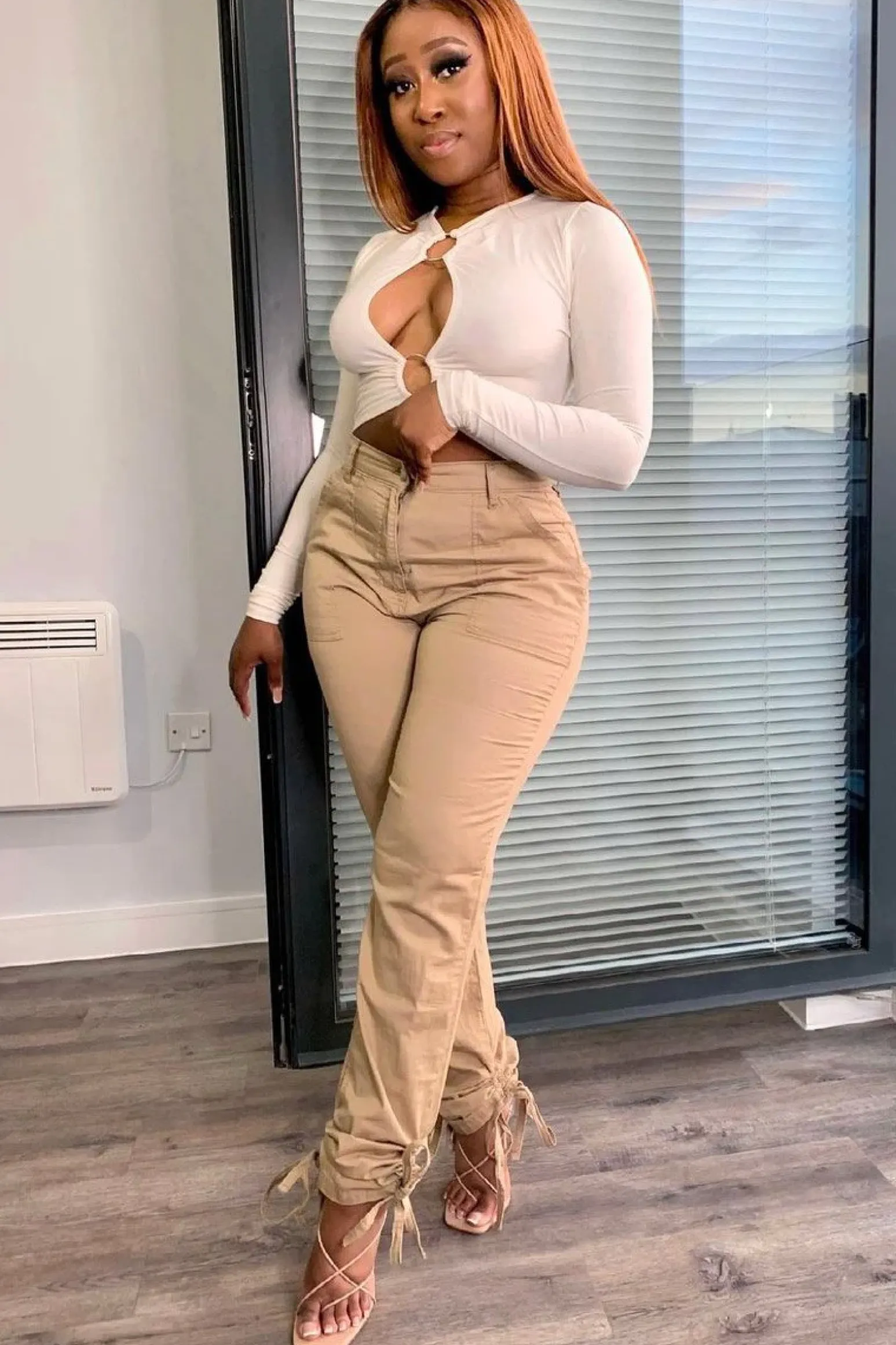 Rebellious Fashion White Ring Detail Cut Out Long Sleeve Bodysuit - Elissa