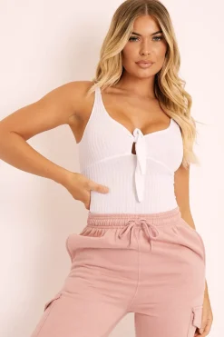 Rebellious Fashion White Tie Bow Ribbed Bodysuit - Maddix