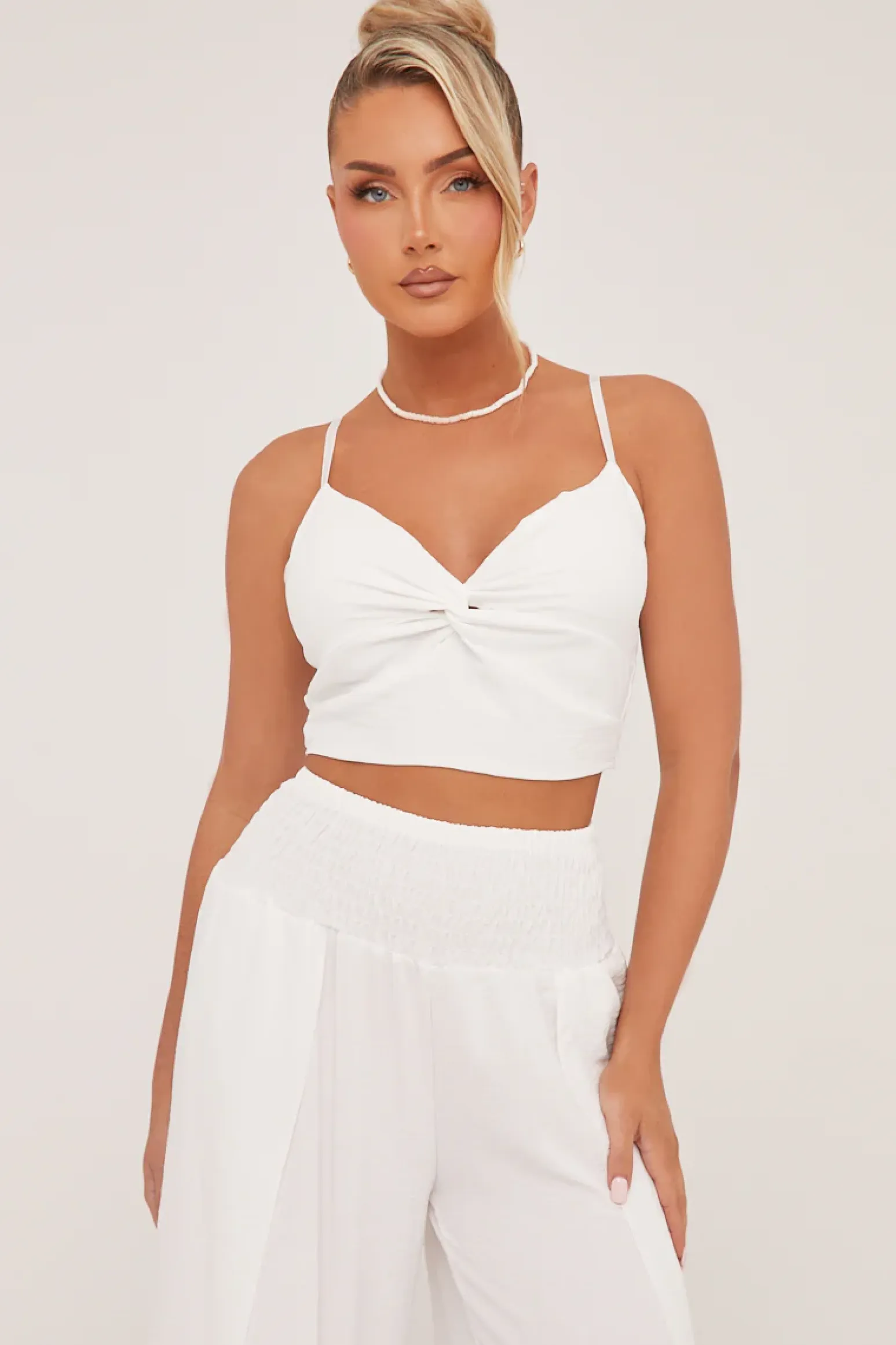 Rebellious Fashion White Twist Front Cropped Top & Flared Leg Trouser Co-ord Set - Lyra