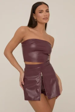 Rebellious Fashion Wine Faux Leather Zip Front Top And Skort Co-ord Set - Saffron
