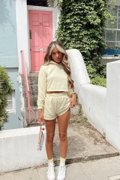 Rebellious Fashion Yellow Hip Cut Out Elasticated Shorts - Zaleia